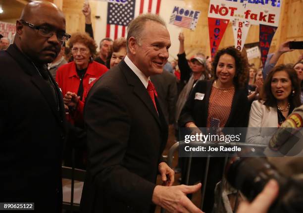 Republican Senatorial candidate Roy Moore arrives to speak during a campaign event at Jordan's Activity Barn on December 11, 2017 in Midland City,...