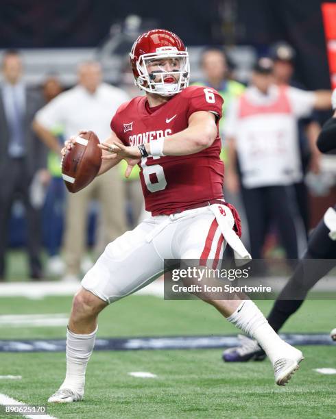 Oklahoma Sooners quarterback Baker Mayfield throws a pass during the Big 12 Championship game between the Oklahoma Sooners and the TCU Horned Frogs...