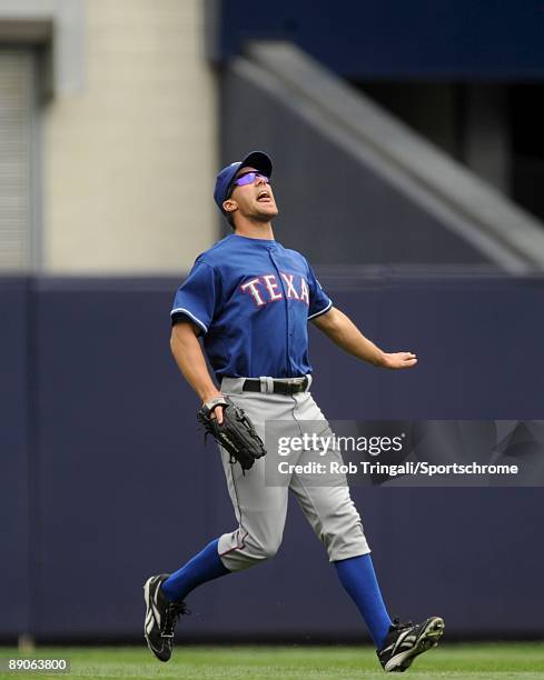 David Murphy of the Texas Rangers calls for a ball against the New York Yankees on June 4, 2009 at Yankee Stadium in the Bronx borough of New York...