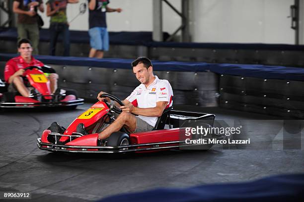 Alex De Angelis of Rep. San Marino and San Carlo Honda Gresini rides his kart during the kart race pre-event for the MotoGP of Germany on July 16,...
