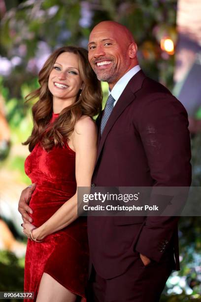 Lauren Hashian and Dwayne Johnson attend the premiere of Columbia Pictures' "Jumanji: Welcome To The Jungle" on December 11, 2017 in Hollywood,...