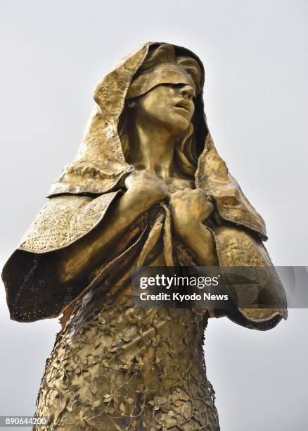 Photo taken on Dec. 11 shows a statue symbolizing Filipino women victims of Japanese military sexual slavery during World War II, euphemistically...