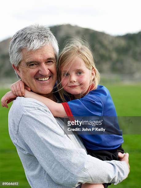 portrait of father and daughter - leanintogether stock pictures, royalty-free photos & images