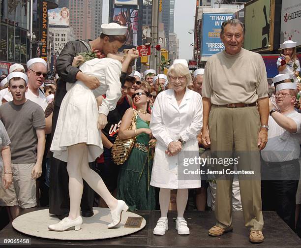 Edith Shain and Carl Muscarello, the couple that appeared in Alfred Eisenstaedt's iconic photo "The Kiss," appear in New York City's Times Square to...