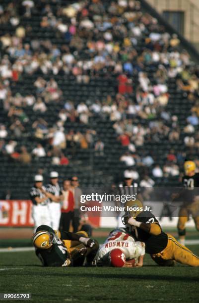 Super Bowl I: Kansas City Chiefs QB Len Dawson in action during sack by Green Bay Packers. Los Angeles, CA 1/15/1967 CREDIT: Walter Iooss Jr.