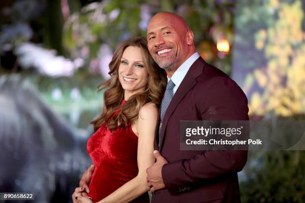 Lauren Hashian and Dwayne Johnson attend the premiere of Columbia Pictures' "Jumanji: Welcome To The Jungle" on December 11, 2017 in Hollywood,...