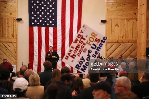 Republican Senatorial candidate Roy Moore speaks during a campaign event at Jordan's Activity Barn on December 11, 2017 in Midland City, Alabama. Mr....