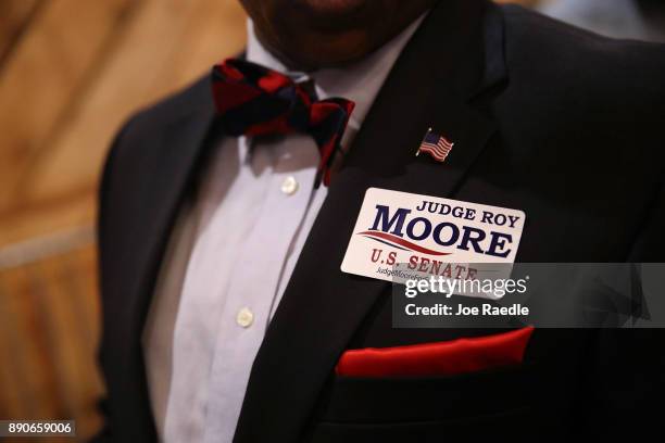 Person wears a campaign sticker for Republican Senatorial candidate Roy Moore during a campaign event at Jordan's Activity Barn on December 11, 2017...