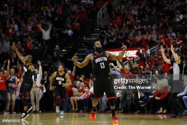 James Harden of the Houston Rockets celebrates after a three point shot in the fourth quarter against the New Orleans Pelicans at Toyota Center on...