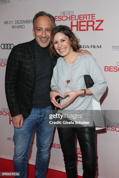 Funda Vanroy and her husband Sanjiv Singh during the 'Dieses bescheuerte Herz' premiere at Mathaeser Filmpalast on December 11, 2017 in Munich,...