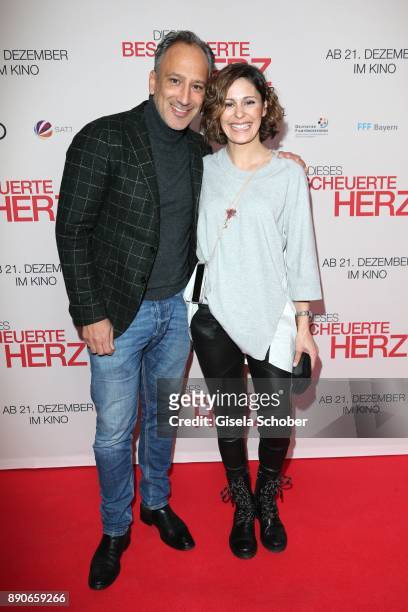 Funda Vanroy and her husband Sanjiv Singh during the 'Dieses bescheuerte Herz' premiere at Mathaeser Filmpalast on December 11, 2017 in Munich,...
