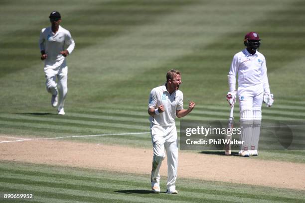 Neil Wagner of New Zealand celebrates his wicket of Roston Chase of the West Indies during day four of the Second Test Match between New Zealand and...