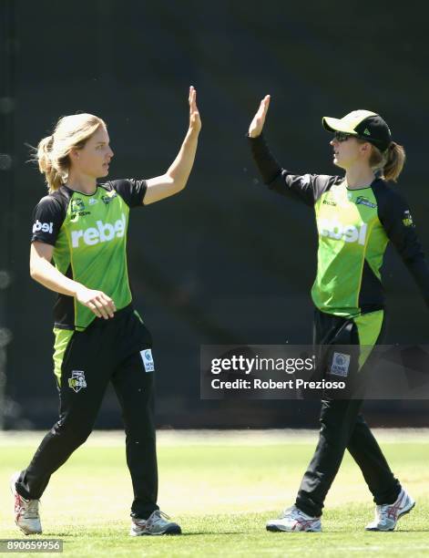 Nicola Carey of the Sydney Thunder celebrates the wicket of Mignon du Preez of the Melbourne Stars during the Women's Big Bash League match between...