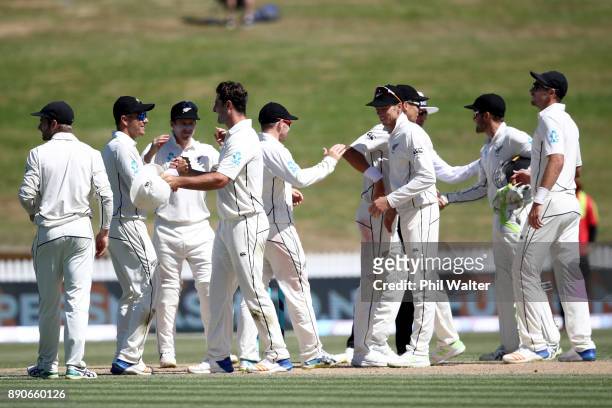 New Zealand celebrates their series win during day four of the Second Test Match between New Zealand and the West Indies at Seddon Park on December...