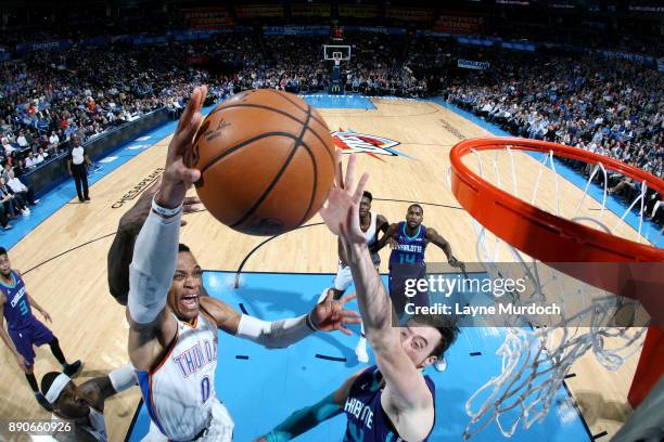 Russell Westbrook of the Oklahoma City Thunder shoots the ball during the game against the Charlotte Hornets on December 11, 2017 at Chesapeake...