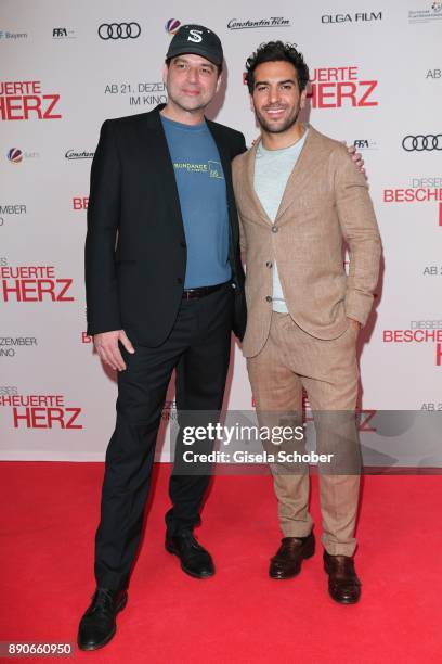 Director Marc Rothemund and Elyas M'Barek during the 'Dieses bescheuerte Herz' premiere at Mathaeser Filmpalast on December 11, 2017 in Munich,...