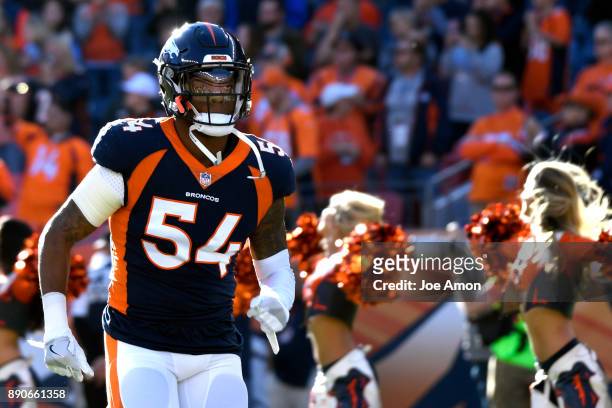 Denver Broncos inside linebacker Brandon Marshall takes the field as the Broncos play the New York Jets at Sports Authority Field at Mile High in...