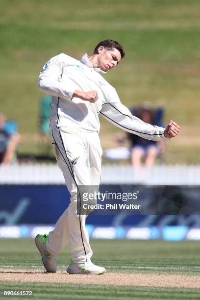 Mitchell Santner of the New Zealand Black Caps celebrates the wicket of Miguel Cummins of the West Indies during day four of the Second Test Match...