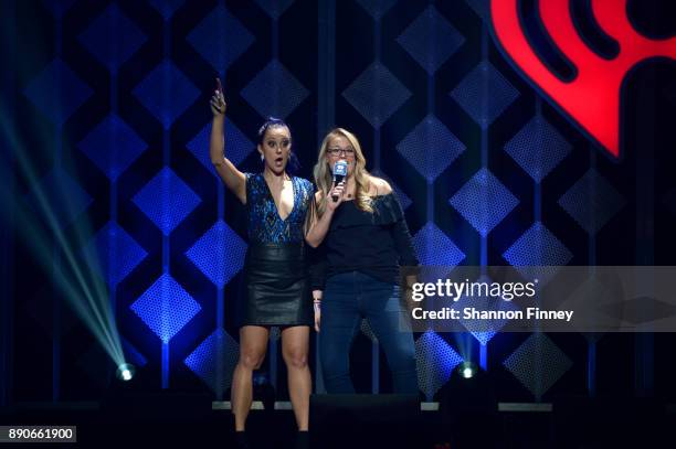 Hot 99.5's Elizabethany and the Capital One winner speak onstage during Hot 99.5's Jingle Ball 2017 Presented by Capital One at Capital One Arena on...
