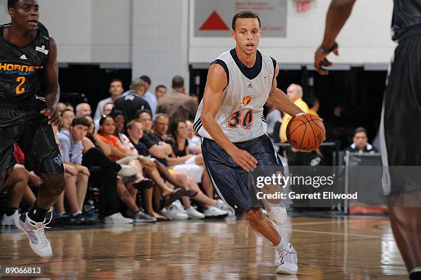 Stephen Curry of the Golden State Warriors brings the ball up court against the New Orleans Hornets during NBA Summer League presented by EA Sports...