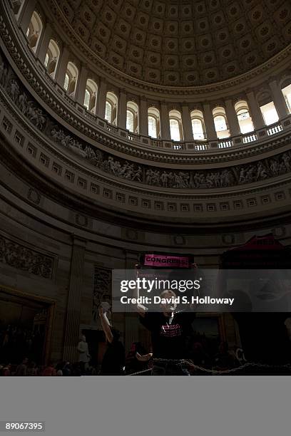 Activists from the northeast, including New York, Philadelphia and Washington, DC protest in the Rotunda of the United States Capitol Building on...