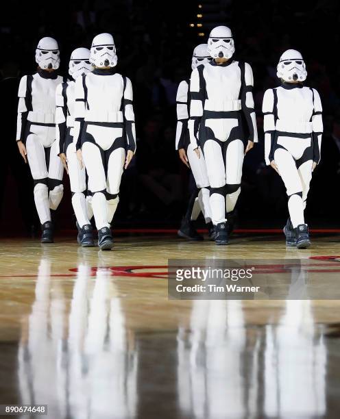 The Houston Rockets Power Dancers perform wearing stormtrooper costumes during Star Wars night during the game between the Houston Rockets and the...