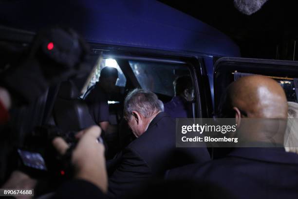 Roy Moore, Republican candidate for U.S. Senate from Alabama, center, leaves a campaign rally in Midland City, Alabama, U.S., on Monday, Dec. 11,...