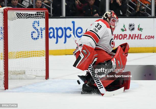 Carolina Hurricanes goalie Scott Darling can't stop the puck as it slips past for a goal in the first period of a game against the Anaheim Ducks, on...