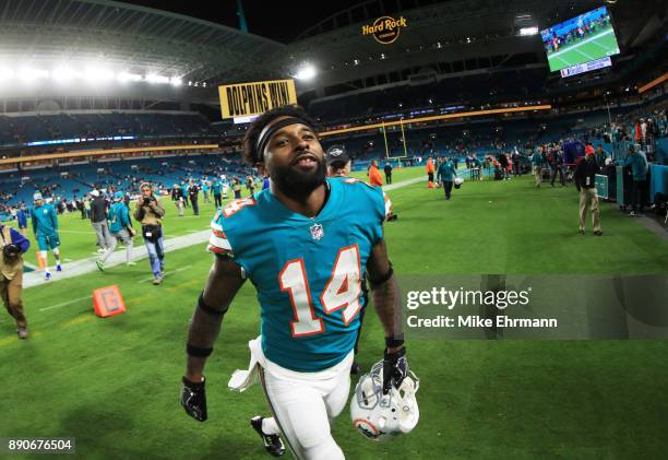 Jarvis Landry of the Miami Dolphins celebrates their 27 to 20 win over the New England Patriots at Hard Rock Stadium on December 11, 2017 in Miami...