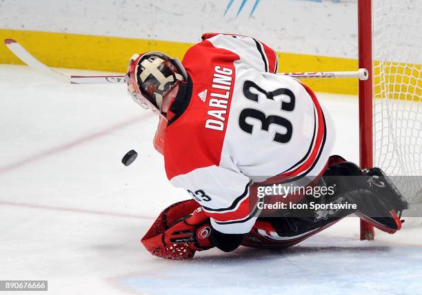 Carolina Hurricanes goalie Scott Darling blocks a shot in the second period of a game against the Anaheim Ducks, on December 11 played at the Honda...