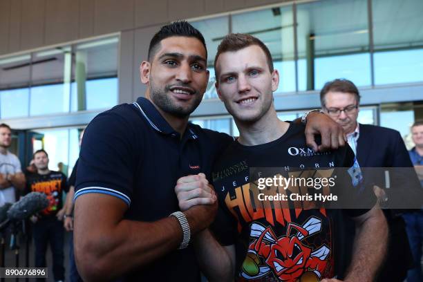 Amir Khan poses with Jeff Horn during the official weigh in at Sky Terrace on December 12, 2017 in Brisbane, Australia. Horn and Corcoran will fight...