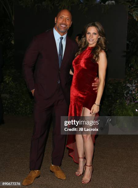 Lauren Hashian and Dwayne Johnson attend the premiere of Columbia Pictures' 'Jumanji: Welcome To The Jungle' on December 11, 2017 in Los Angeles,...