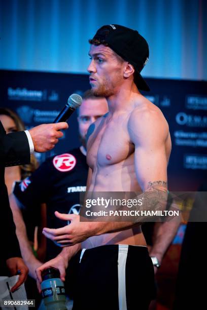 British boxer Gary Corcoran speaks during the pre-fight weigh-in at the Brisbane Convention Centre in Brisbane on December 12 the eve of the World...