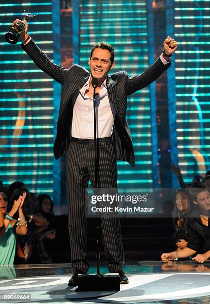 Marc Anthony accepts award on stage at Univisions 2009 Premios Juventud - Show at Bank United Center on July 16, 2009 in Coral Gables, Florida.