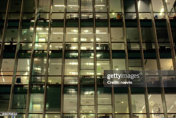 night offices - roevin stock pictures, royalty-free photos & images