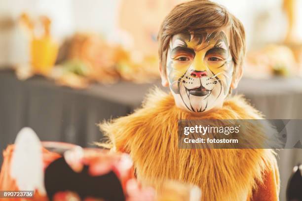 hungry lion - body paint stock pictures, royalty-free photos & images