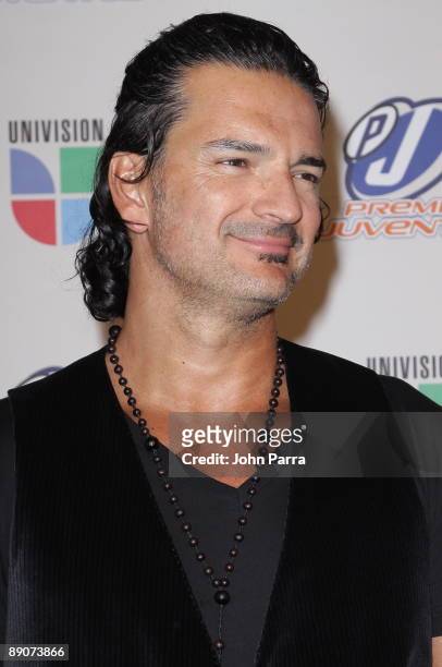 Ricardo Arjona poses in the press room during Univision's 2009 Premios Juventud Awards at Bank United Center on July 16, 2009 in Coral Gables,...