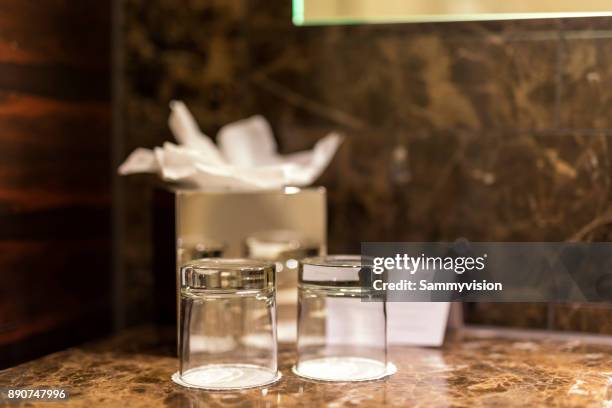 a corner in the restroom - hotel bathroom stock pictures, royalty-free photos & images