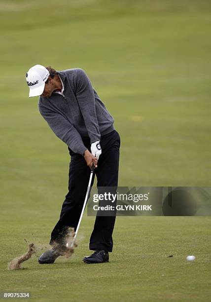 Australian golfer Adam Scott plays a shot on the 7th fairway, on the second day of the 138th British Open Championship at Turnberry Golf Course in...