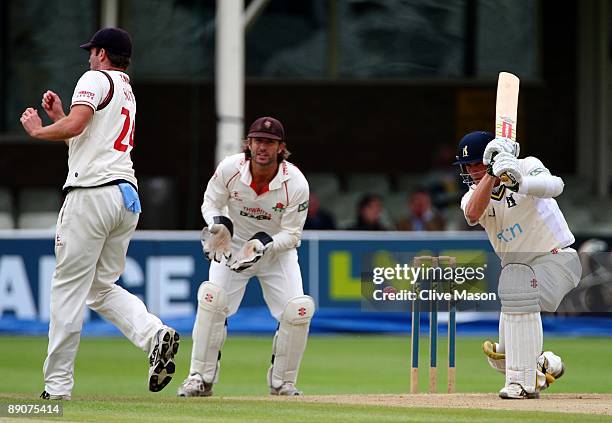 Tom Smith of Lancashire takes evasive action as Chris Woakes of Warwichshire plays a shot during Day 3 of the LV County Championship Division One...