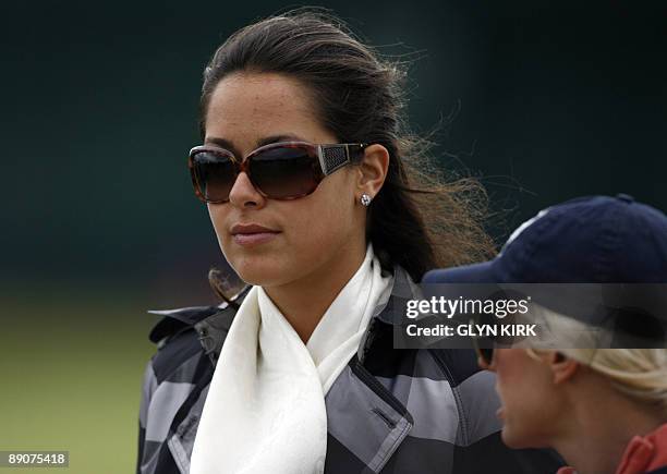 Serbian tennis player Ana Ivanovic watches her patner Australian golfer Adam Scott on the 7th fairway, on the second day of the 138th British Open...