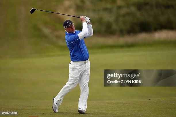 English golfer Richard Finch plays a shot on the 7th fairway, on the second day of the 138th British Open Championship at Turnberry Golf Course in...