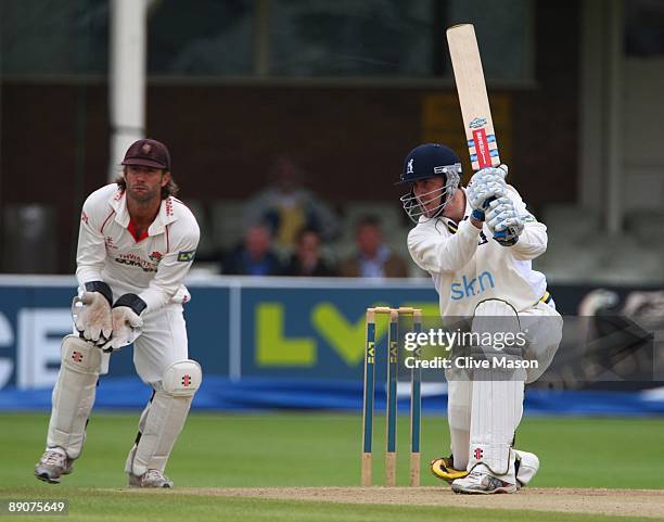 Rikki Clarke of Warwichshire plays a delivery as Luke Sutton of Lancashire keeps wicket during Day 3 of the LV County Championship Division One match...