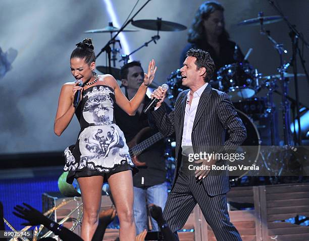 La 5ta Estacion and Marc Anthony performs on stage at Univision's 2009 Premios Juventud Awards at Bank United Center on July 16, 2009 in Coral...