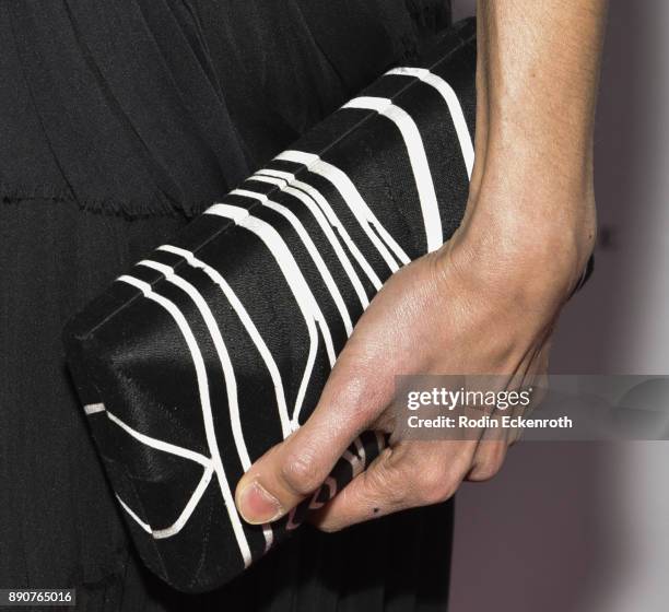 Ballet dancer Stella Abrera, clutch detail, attends the American Ballet Theatre's annual Holiday Benefit Dinner and Performance at The Beverly Hilton...