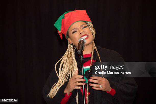 Singer-songwriter Syleena Johnson performs onstage during the '5th Annual Caroling with Q Parker and Friends' at Atlanta Marriott Buckhead on...