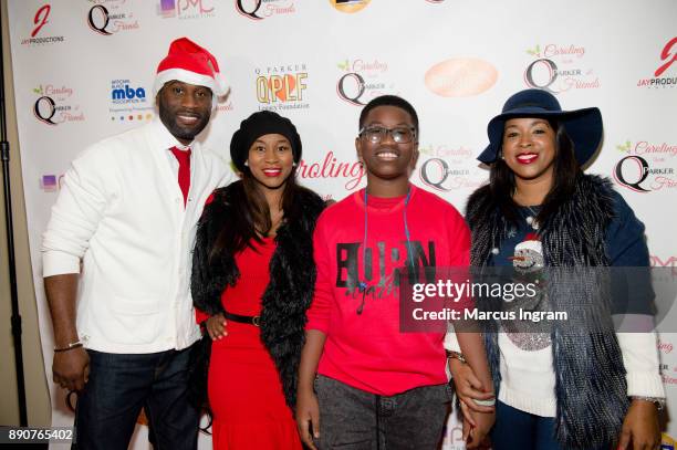 Parker, Kahdijiha Rowe, Quinnes Parker, Jr., and Sharlinda Parker attend the '5th Annual Caroling with Q Parker and Friends' at Atlanta Marriott...
