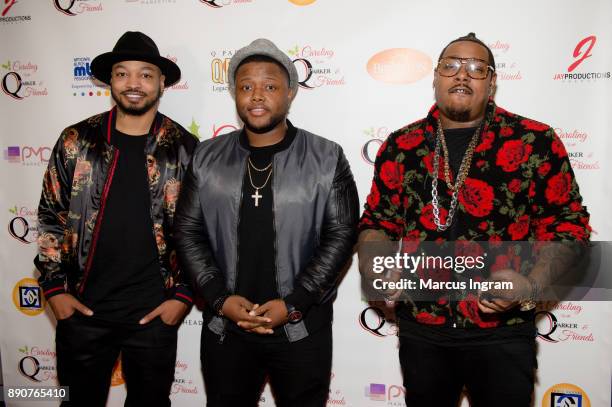 Qwanell Mosley, Mike McCluney, and Robert Taylor attend the '5th Annual Caroling with Q Parker and Friends' at Atlanta Marriott Buckhead on December...