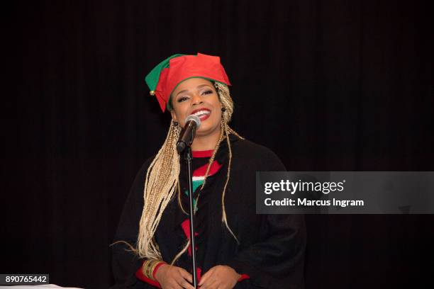 Singer-songwriter Syleena Johnson performs onstage during the '5th Annual Caroling with Q Parker and Friends' at Atlanta Marriott Buckhead on...