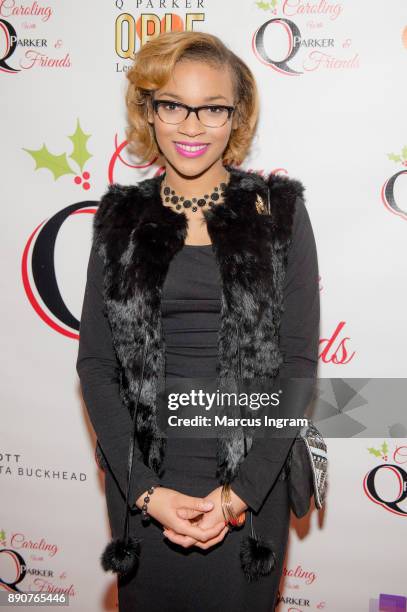 Singer Sharon Moore attends the '5th Annual Caroling with Q Parker and Friends' at Atlanta Marriott Buckhead on December 11, 2017 in Atlanta, Georgia.